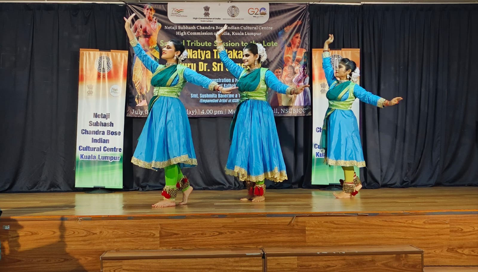 [Students of DKCC performing a tribute